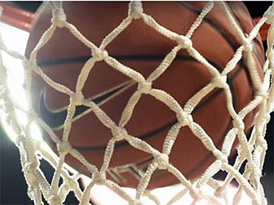 photo illustration of a basketball net and ball