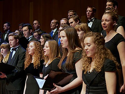 member of a USU Choral ensemble performing