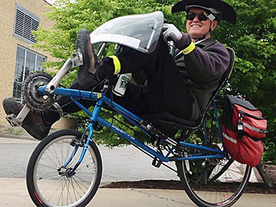 USU staff member Bob Bayn biking to work