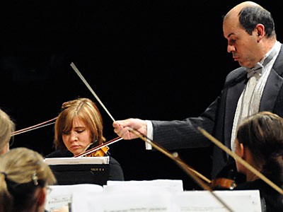 USU professor Sergio Bernal conducting the USU Symphony Orchestra