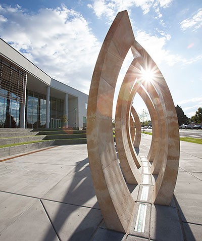A sculpture located outside the new building