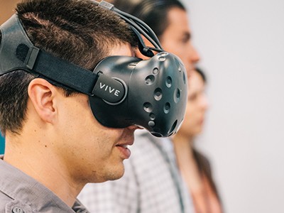 person wearing virtual reality glasses