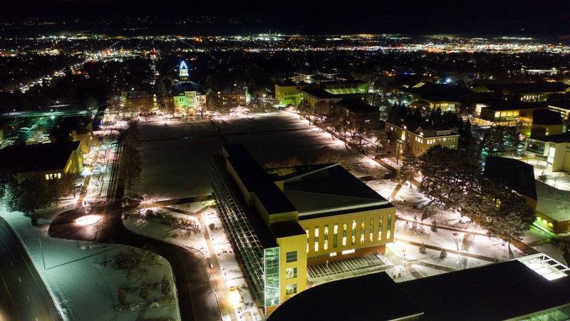 An aerial view of USU's Logan campus at night.