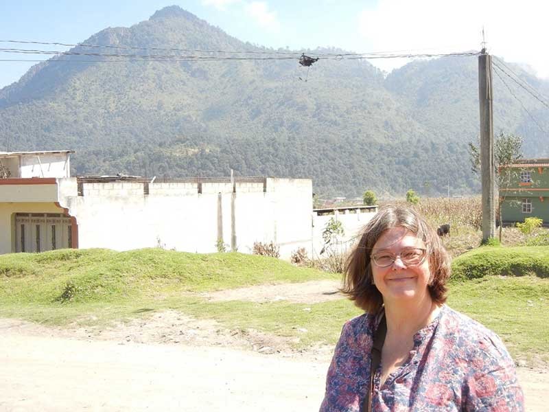 Claudia Rade lin the field in Guatemala