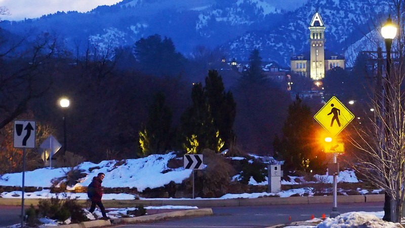 view of Old Main tower from below campus.