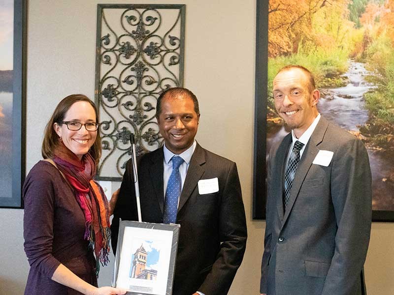 Kate Stephens and Sean Damitz with Sachin Pavithran