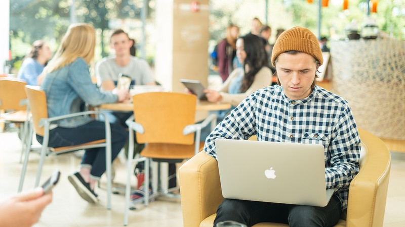 Student Works on a Laptop