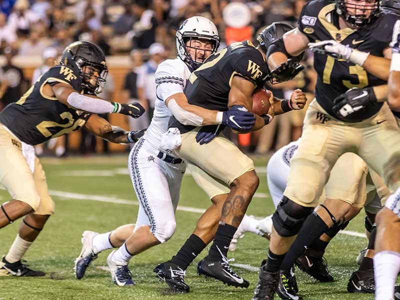 David Woodward on the field with rivals