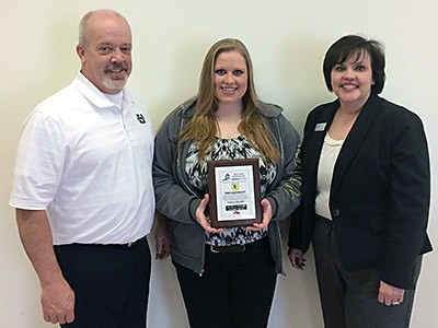 Diannne Althouse, Dining Services' December Employee of the Month with administrator