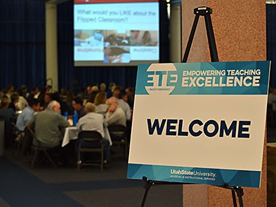 An Empowering Teaching Excellence conference sign at a session