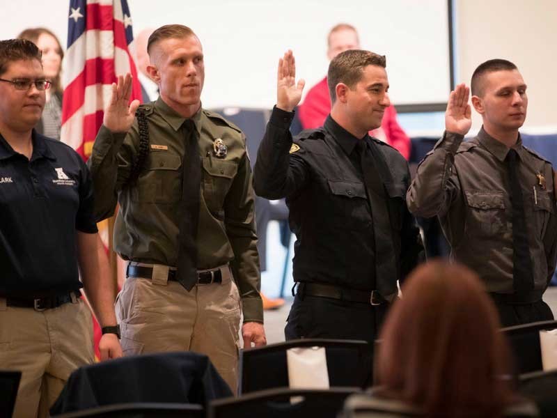 USU Eastern Police Academy graduates being sworn in.