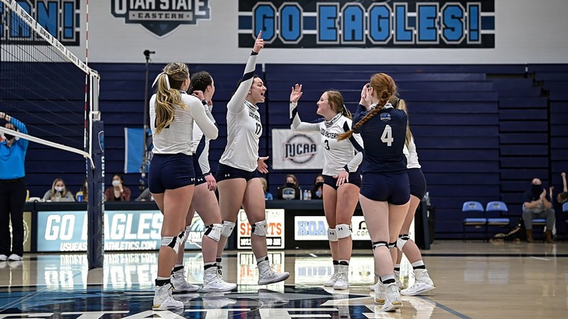 USU Eastern volleyball celebrates after a point is scored.