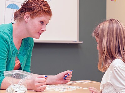USU education student with a youngster