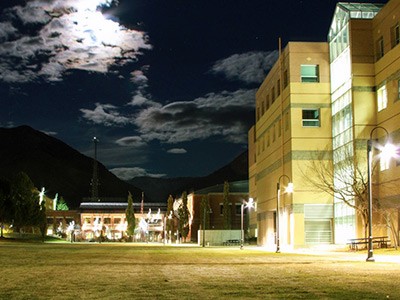 a nighttime view of USU's education building