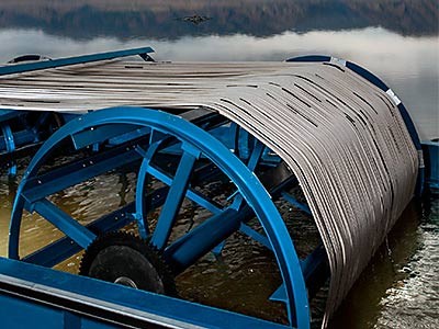 algae grows on rotating drums
