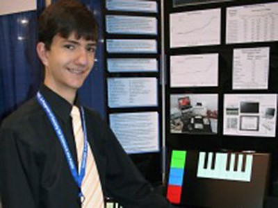 Taylor Boardman with his research presentation