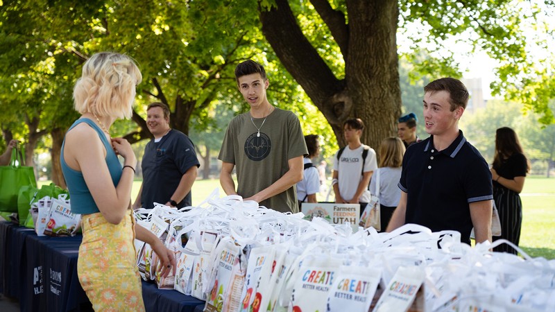 Students volunteers helped back and distribute food purchased from local farmers to USU students.