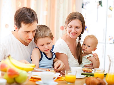 A family at the breakfast table.