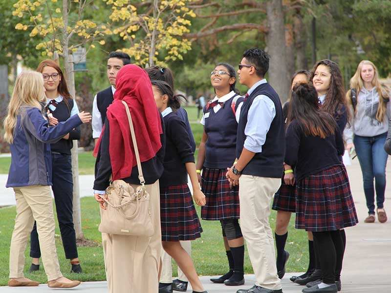A group of high school students visiting the USU campus