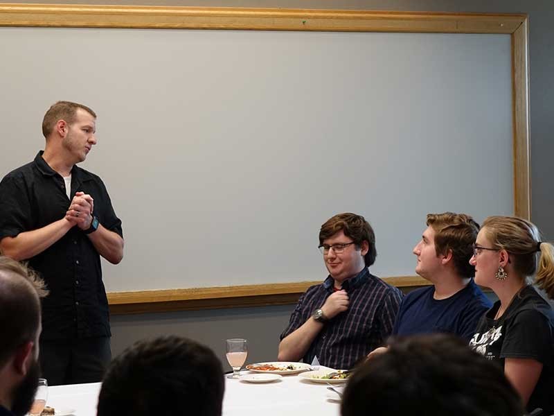 Chuck Oughton with students Jacob Hayden, Alec Smitten and Jessi Mellinthin