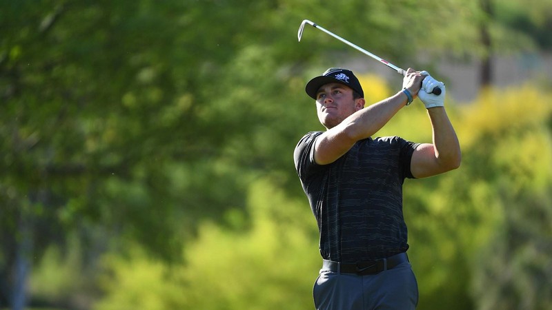 Hayden Eckert playing golf.
