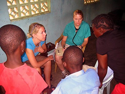 student researchers translate for Dr. Daily conducting research in the Dominican Republic