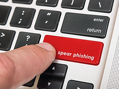 a graphici illustration of a computer keyboard and a 'spear phising' tab