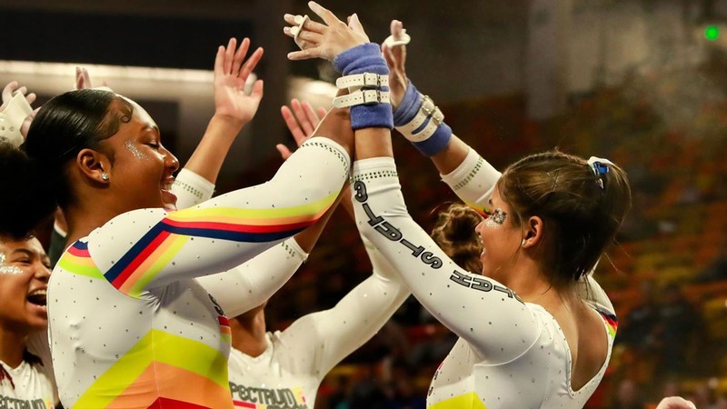 USU gymnasts celebrate.