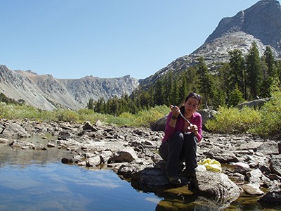 Janice Brahney collecting water samples