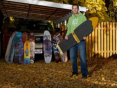 Jeremy Jensent with a sampling of his powdersurfing boards