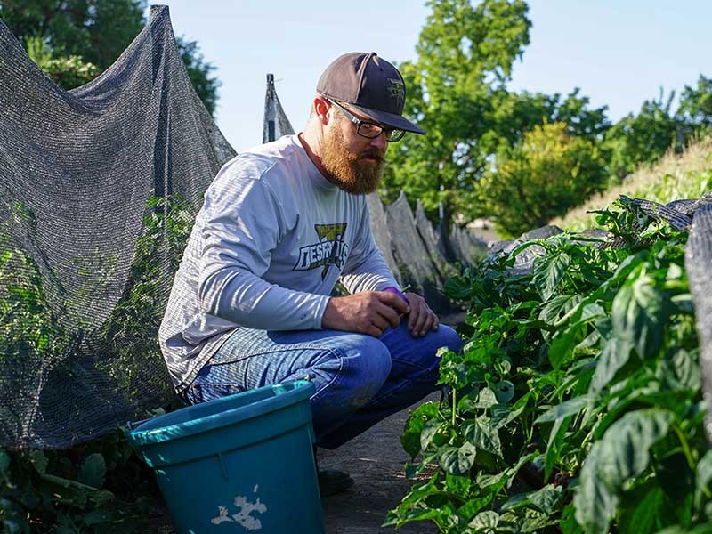 Josh Martin in a garden