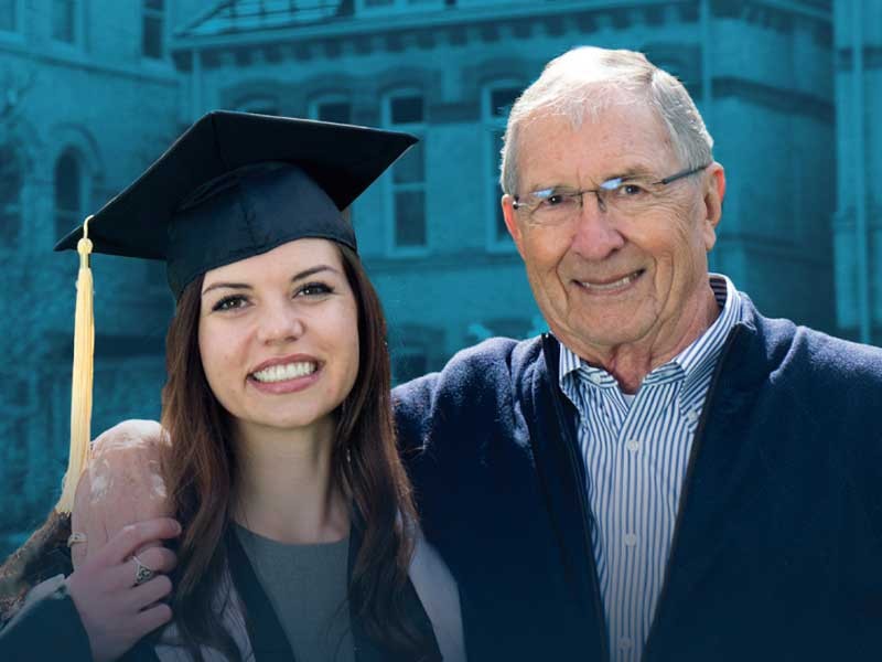 USU graduate Emily Robb pictured with her grandfather, USU alum Jed Pitcher.