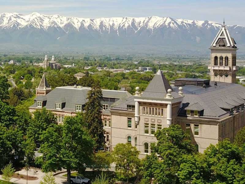 Old Main with view of Logan in the background