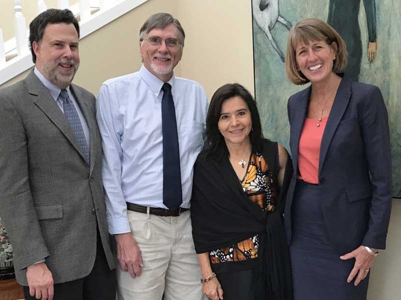 Maria Luisa Spicer-Escalante with Joseph Ward, Bradford Hall and USU President Noelle Cockett