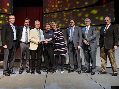 the group accepting the award on behalf of Dallas Hanks at the National Biodiesel Conference