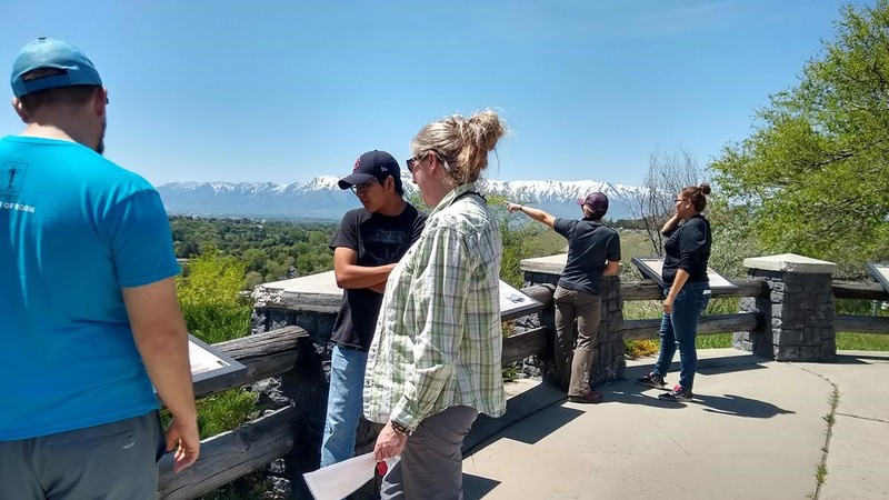 students looking over an outlook.