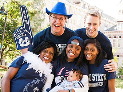 a family portrait from a USU Parent and Family Weekend