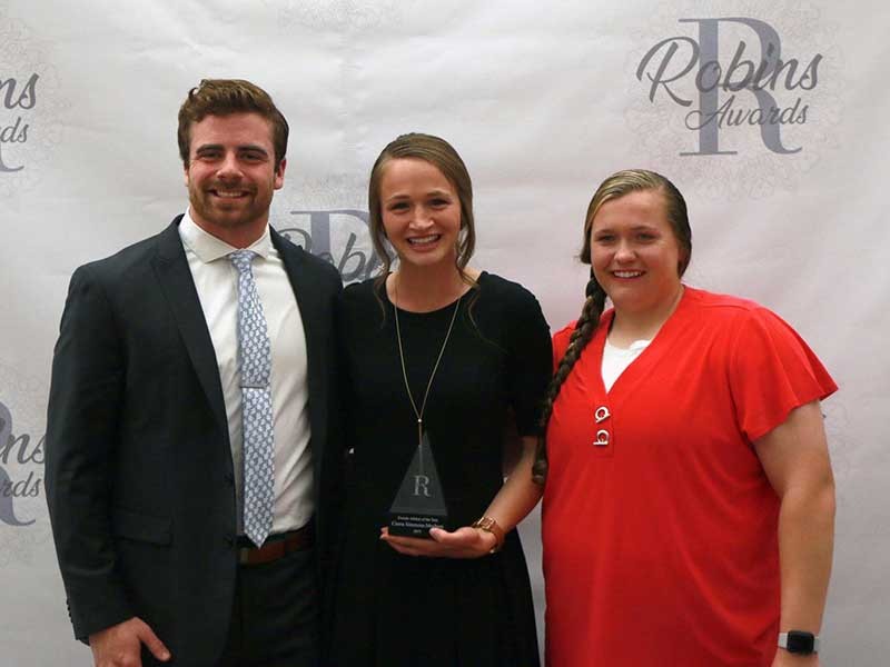 Cierra Simmons-Mecham with fellow track athletes Kyle Morris and Brenn Flint