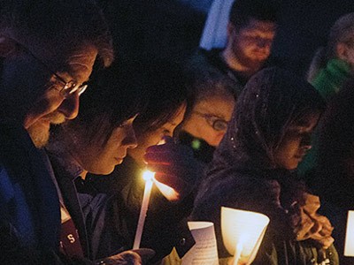 the crowd at the Muslin candlelight vigil in Logan