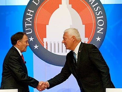 Utah Gov. Gary Herbert shaking hands with his opponent Mike Weinholtz at USU