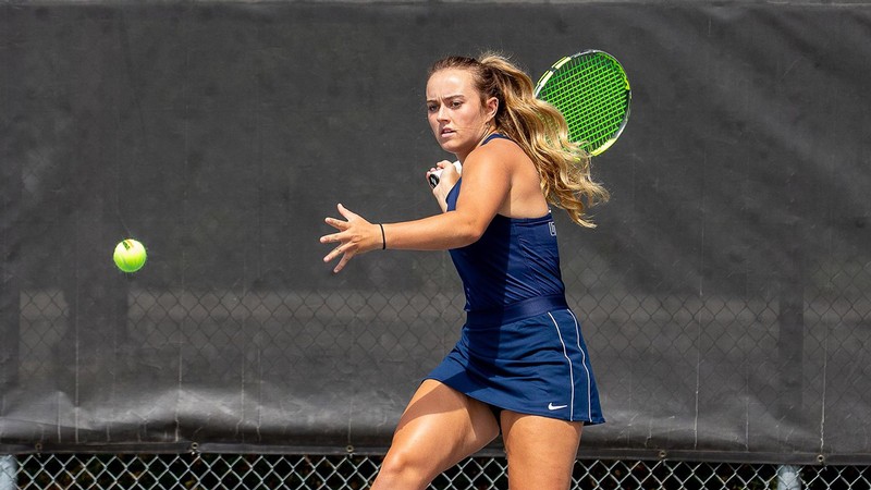 USU Women’s Tennis senior Hannah Jones in action on the court.
