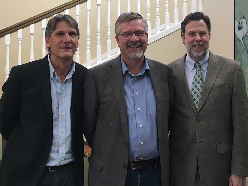 Derrik Tollefson (center) with John Cockett and Joseph Ward