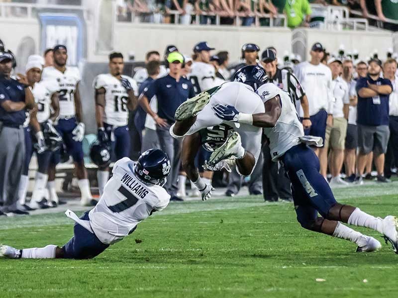 USU football players in action