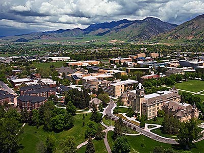 an aerial view of the Utah State University campus, including Old Main