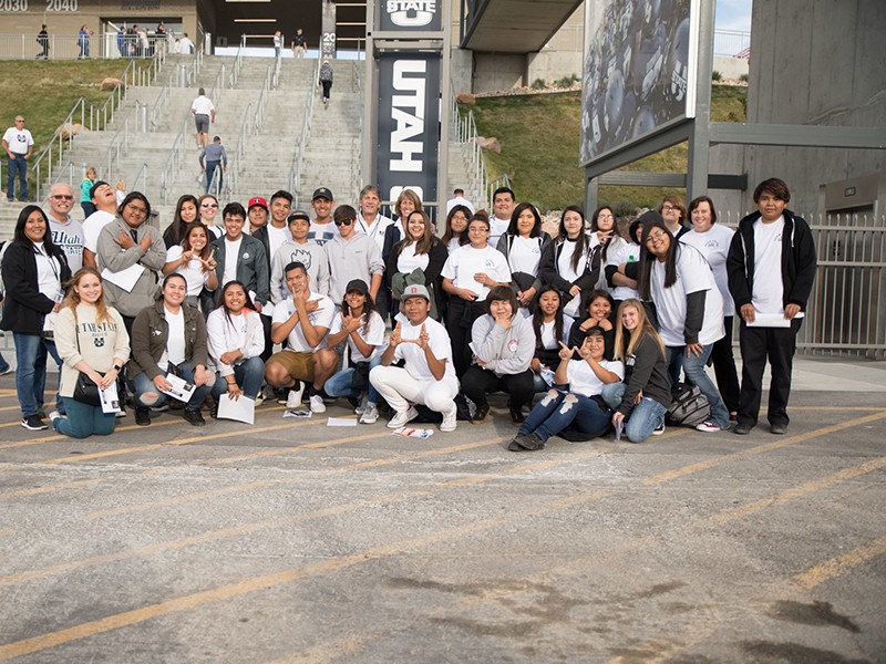 Ute Tribe students with USU President Noelle Cockett