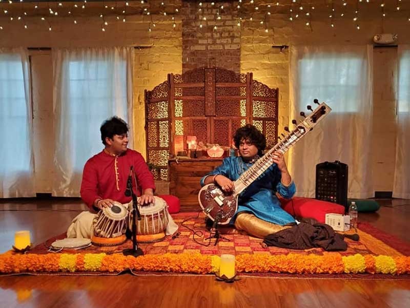 Music of Benares playing the sitar.