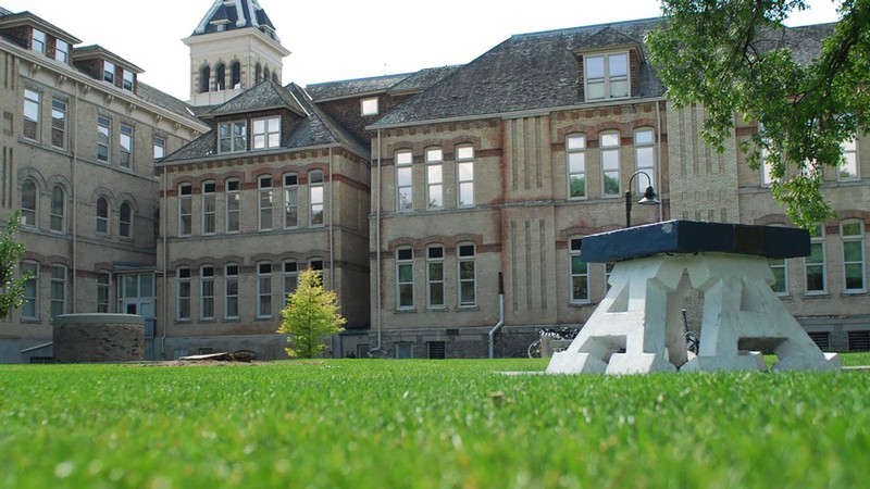 Block A with Old Main in the background.