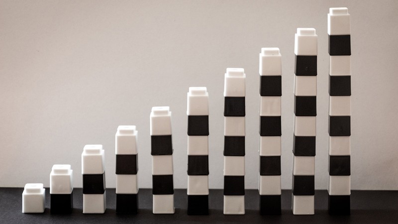 Building blocks stacked in a row.