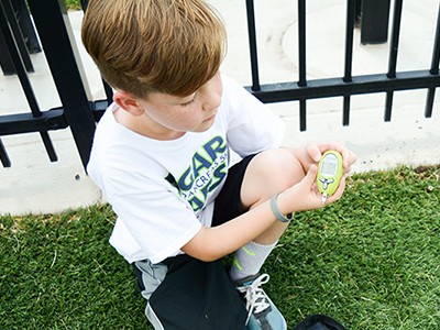Chris Thurston checking his blood glucose levels.