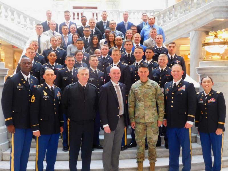 Utah Lt. Gov. Spencer Cox (center, front row) stands with Utah State University Army ROTC cadets